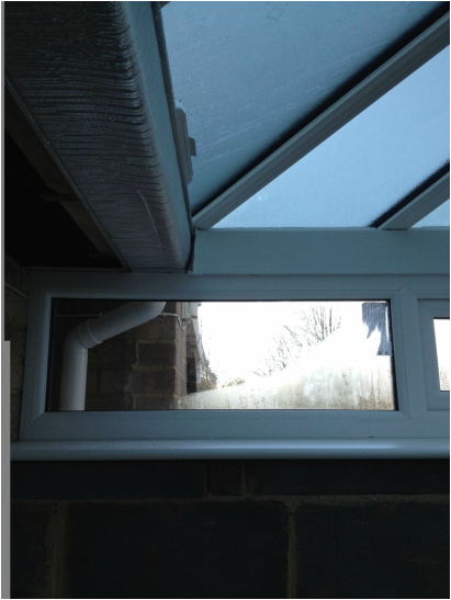 A review of AB Conservatories Ltd and their workmanship.... Window frame bowing under the weight from the box gutter by AB Conservatories Ltd.