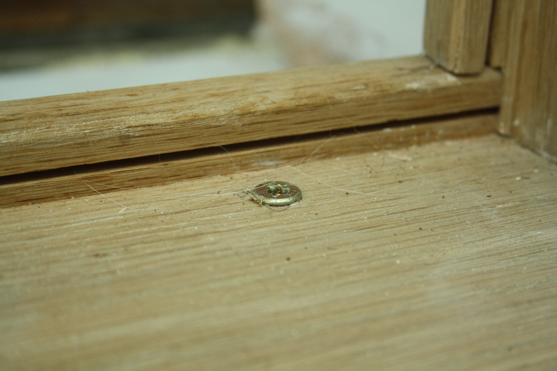 AB Conservatories Ltd attempted to fit an external door frame.  This is a close up of one of the screws that was left visible. Want an honest review of AB Conservatories Ltd's work?